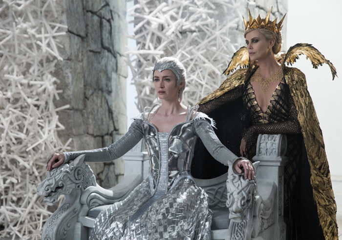 (L to R) Wicked sisters Freya (EMILY BLUNT) and Queen Ravenna (CHARLIZE THERON) threaten the enchanted land with twice the darkest force it’s ever seen in the epic action-adventure "The Huntsman: Winter’s War," a breathtaking new tale nested in the legendary saga.