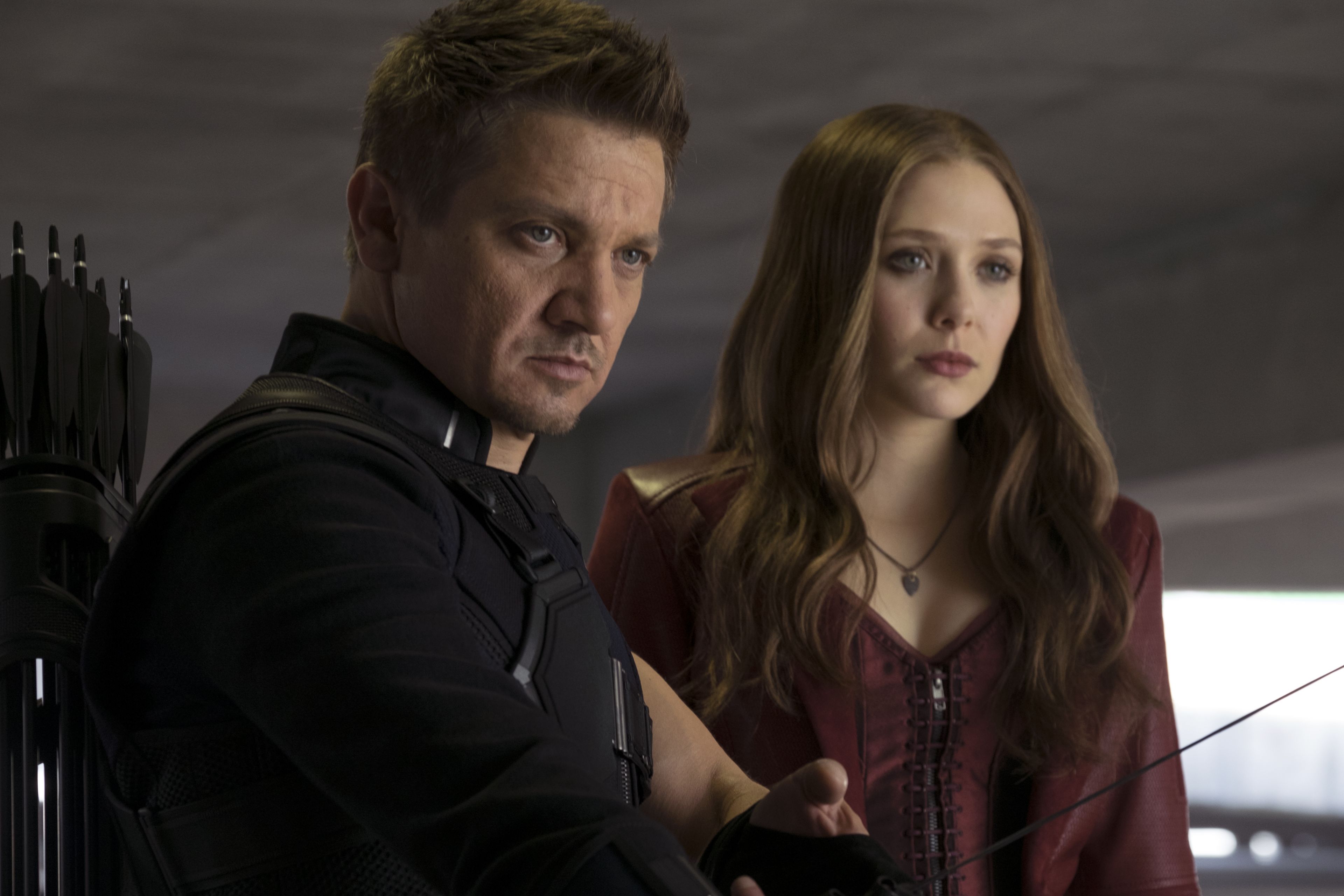 Marvel's Captain America: Civil War..L to R: Hawkeye/Clint Barton (Jeremy Renner) and Scarlet Witch/Wanda Maximoff (Elizabeth Olsen)..Photo Credit: Zade Rosenthal..© Marvel 2016