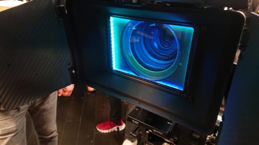 Diffusion filter in a mattebox glowing with blue-green light