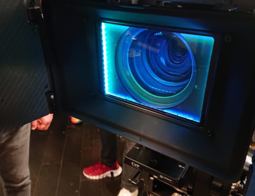 Diffusion filter in a mattebox glowing with blue-green light