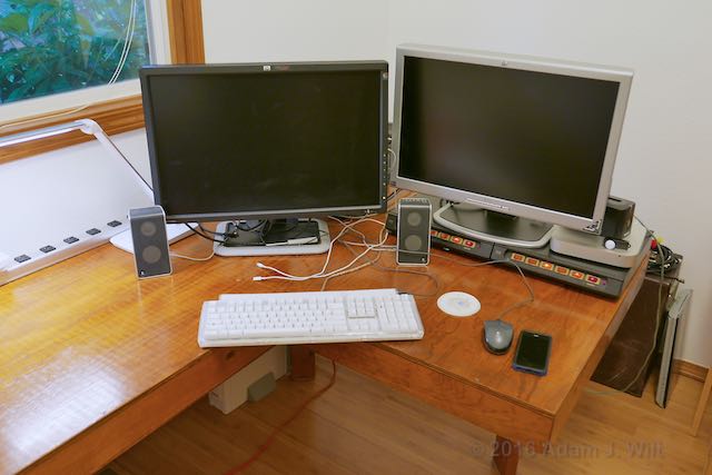 Two monitors on the desk