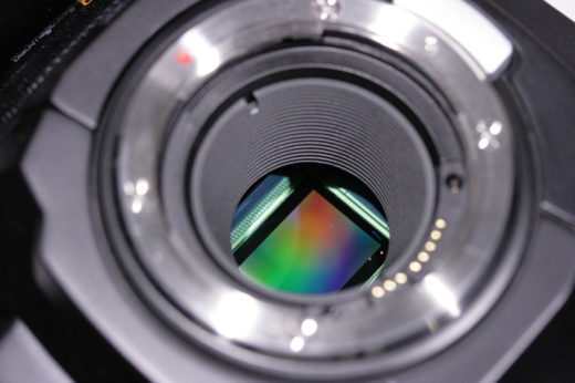 Digital imaging sensor showing rainbow colours from optical interference phenomena