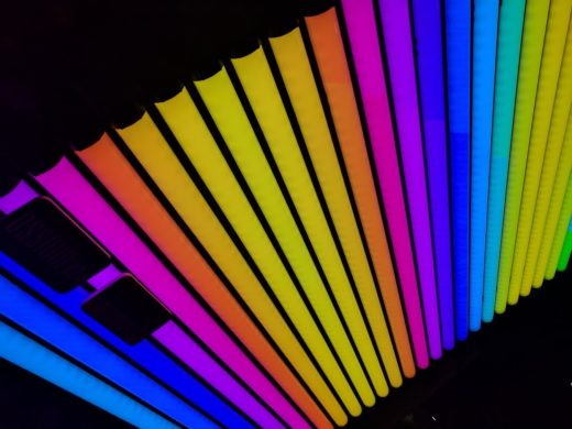 A bank of several tens of LED-based fluorescent tube simulations configured to produce a spectrum of colour from red to blue.