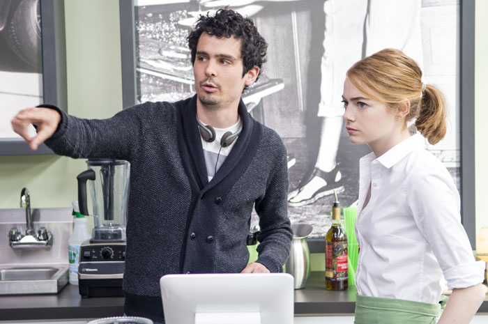 Director Damien Chazelle and Emma Stone on the set of LA LA LAND.