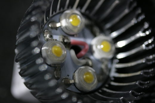 Closeup view of an LED-based replacement for a two inch wide, MR16 lightbulb, of a type that may flicker.