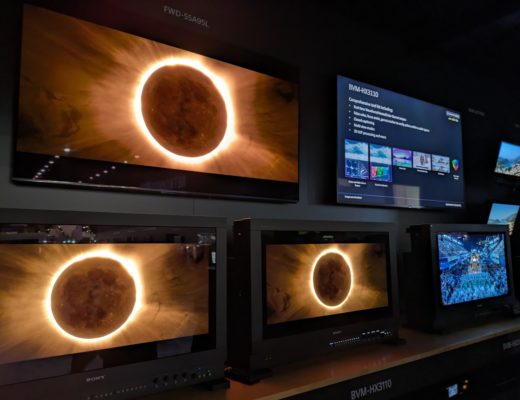 Three precision colour reference displays displaying images of a solar eclipse on the Sony booth at NAB 2024.