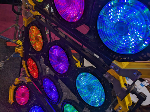 Old school lights are creating brand new opportunities for filmmakers 2 An array of high-power LED movie lights in various saturated colours.