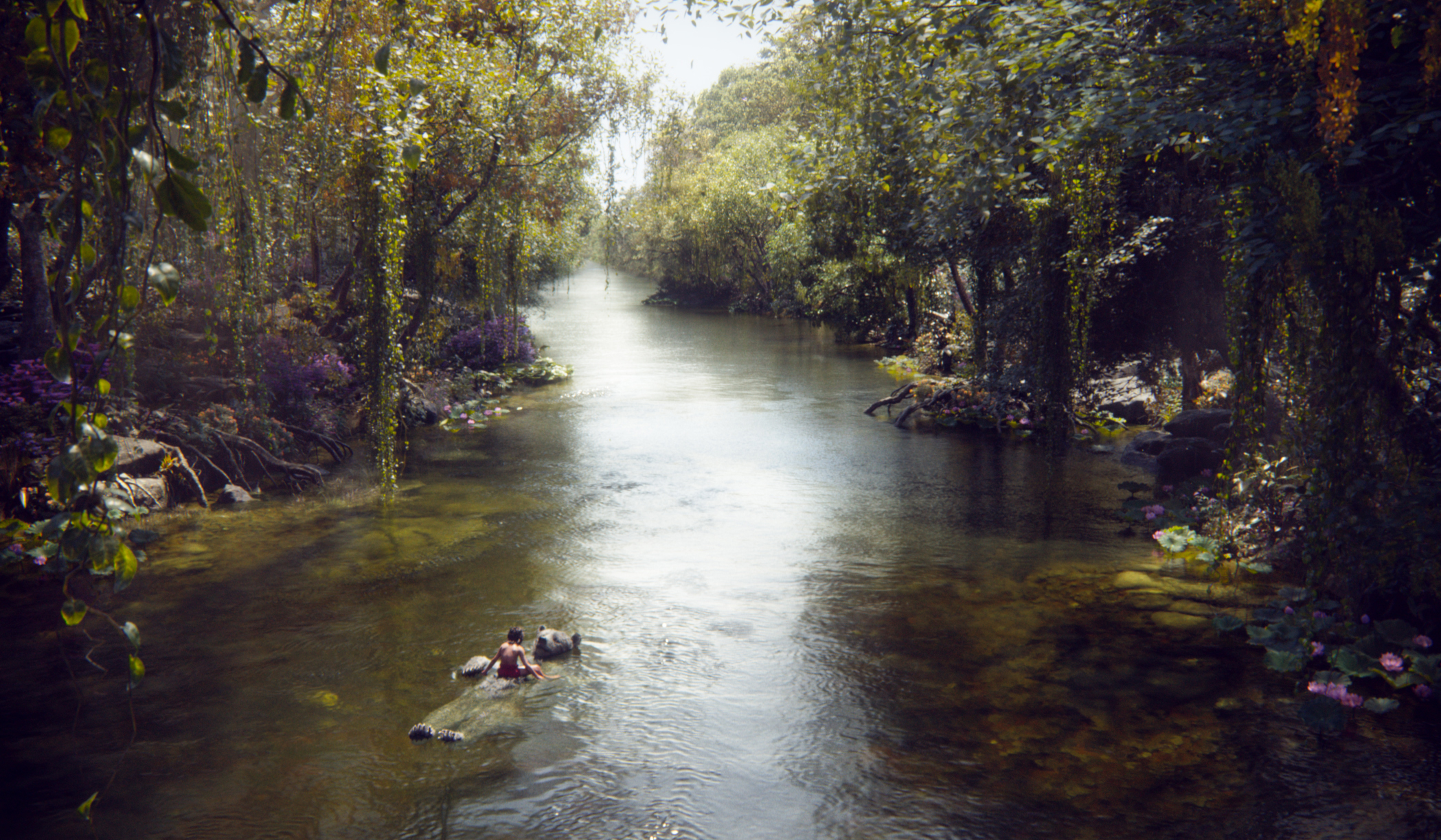 Mowgli (newcomer Neel Sethi) and Baloo (voice of Bill Murray) float down a river in “The Jungle Book,” an all-new live-action epic adventure about Mowgli, a man-cub raised in the jungle by a family of wolves, who embarks on a captivating journey of self-discovery when he’s forced to abandon the only home he’s ever known. In theaters April 15, 2016...©2015 Disney Enterprises, Inc. All Rights Reserved.