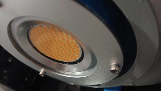 Closeup of the compact chip-on-board array of an LED hard light, with warm and cool emitters visible with different yellow phosphors.