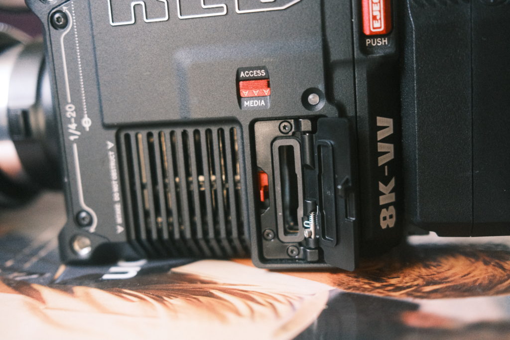 The left side of the RED V-Raptor with the memory card door open.