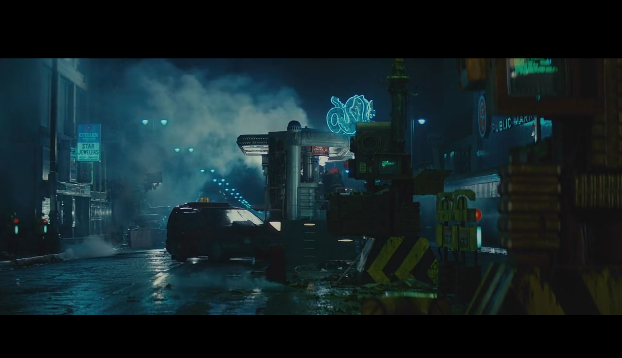 A dark, sci-fi street scene from Blade Runner