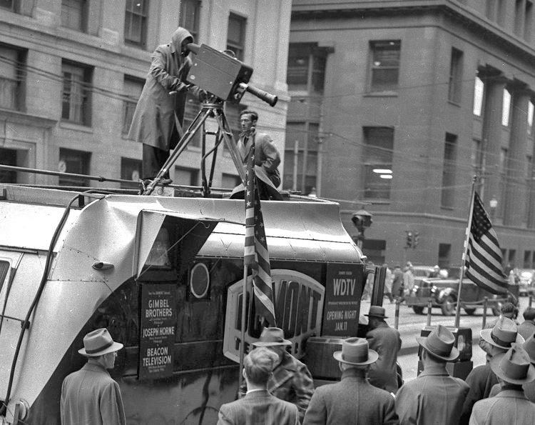 The WDTV Dumont remote truck parked on a downtown Pittsburgh, Pennsylvania, street and draws crown wanting to see themselves on television. Provided by the Texas Museum of Broadcasting & Communications www.txmbc.org 