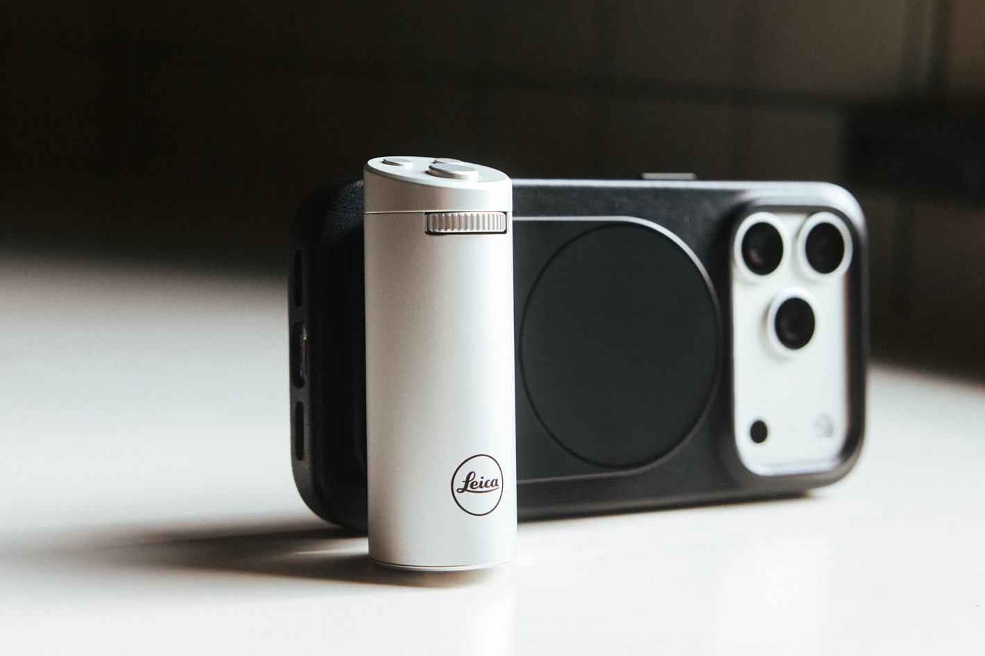 Leica LUX camera grip for the iPhone now in silver finish