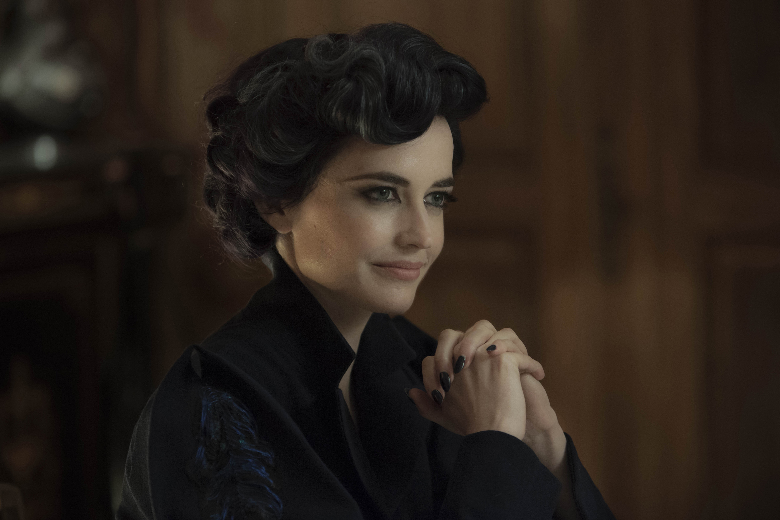 DF-02399crop - Eva Green portrays Miss Peregrine, who oversees a magical place that is threatened by powerful enemies. Photo Credit: Leah Gallo.