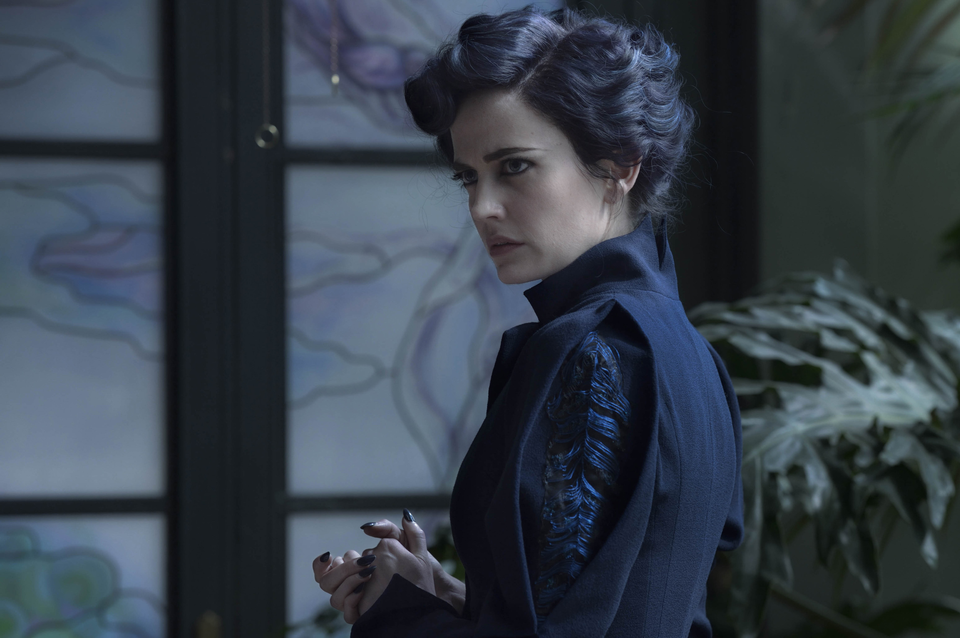 DF-04244 - Eva Green portrays Miss Peregrine, who oversees a magical place that is threatened by powerful enemies. Photo Credit: Jay Maidment.