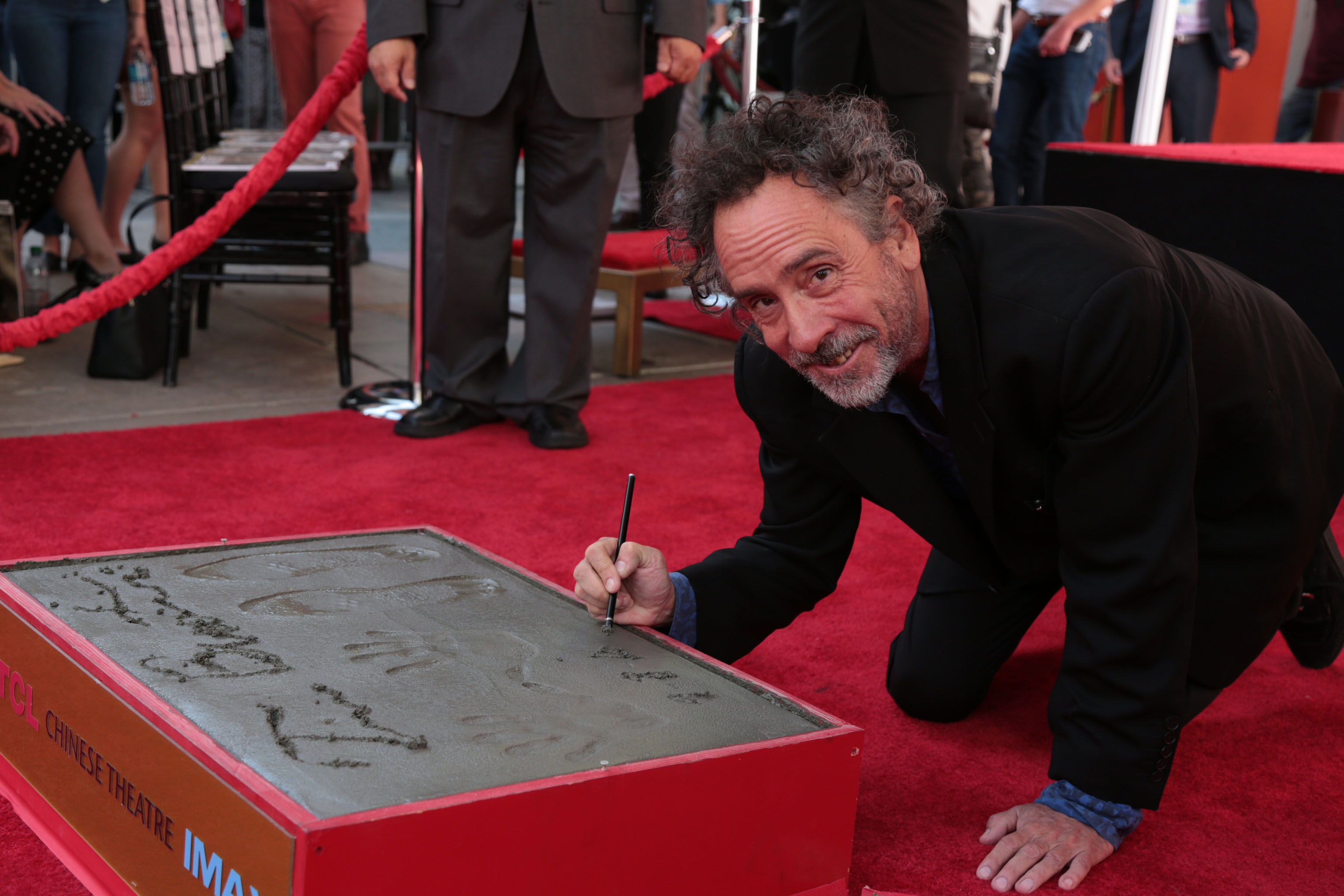 Tim Burton celebrates at his Hand & Footprint Ceremony presented by 20th Century Fox in celebration of his newest film "Miss Peregrine's Home for Peculiar Children" at the TCL Chinese Theatre in Los Angeles, CA on September 8, 2016. (Photo: Alex J. Berliner/ABImages)