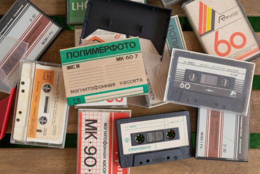 A pile of compact cassette tapes, some cased, some not, many with cyrillic lettering. If your archive looks like this, worry.