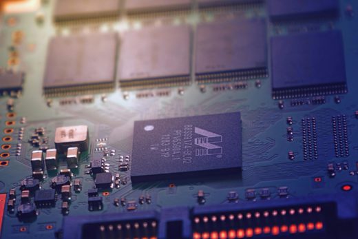 2025 in review: AI in mittens 3 Printed circuit board with computer chips of roughly the type used to create AI.