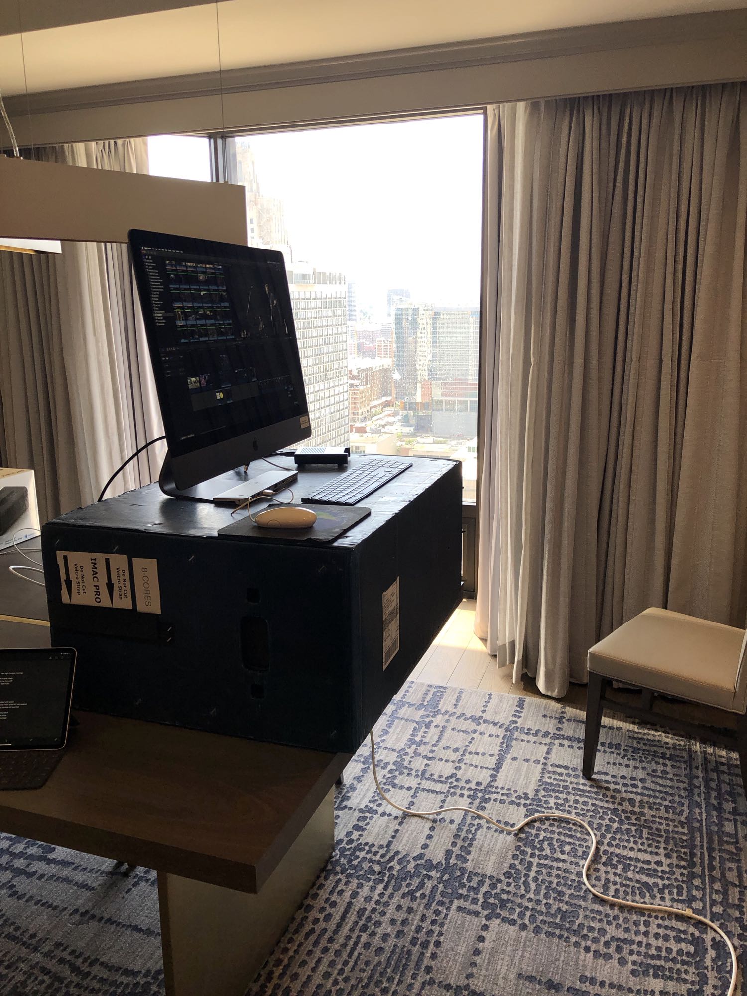 standing desk in the hotel made from the shipping container