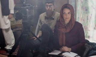 Left to right: Nicholas Braun plays Tall Brian and Tina Fey plays Kim Baker in Whiskey Tango Foxtrot from Paramount Pictures and Broadway Video/Little Stranger Productions in theatres March 4, 2016.